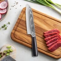 Sumisu Knives Santoku Black sur planche